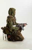  Photos John Hopkins Army Postapocalyptic Suit Poses kneeling whole body 0007.jpg